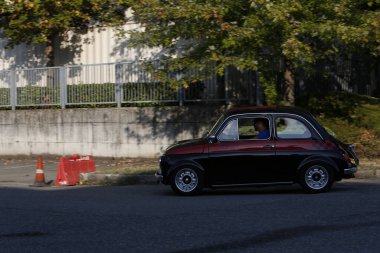 Bibbiano-Reggio Emilia Italy - 07 15 2015 : Free rally of vintage cars in the town square Fiat 500 black. High quality photo