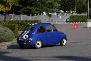 Bibbiano-Reggio Emilia Italy - 07 15 2015 : Free rally of vintage cars in the town square blue viper Fiat 500. High quality photo