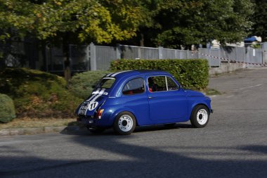 Bibbiano-Reggio Emilia Italy - 07 15 2015 : Free rally of vintage cars in the town square blue viper Fiat 500. High quality photo