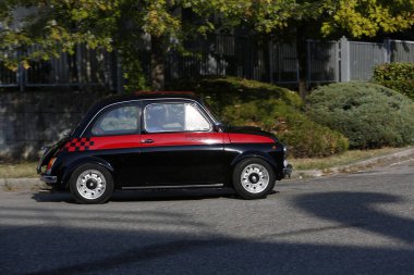 Bibbiano-Reggio Emilia Italy - 07 15 2015 : Free rally of vintage cars in the town square Fiat 500 black. High quality photo