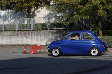 Bibbiano-Reggio Emilia Italy - 07 15 2015 : Free rally of vintage cars in the town square blue viper Fiat 500. High quality photo