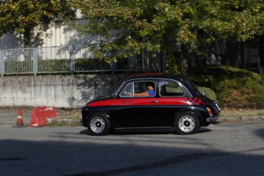 Bibbiano-Reggio Emilia Italy - 07 15 2015 : Free rally of vintage cars in the town square Fiat 500 black. High quality photo