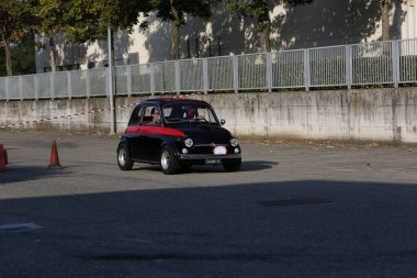 Bibbiano-Reggio Emilia Italy - 07 15 2015 : Free rally of vintage cars in the town square Fiat 500 black. High quality photo