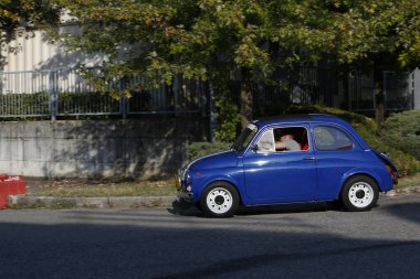 Bibbiano-Reggio Emilia Italy - 07 15 2015 : Free rally of vintage cars in the town square blue viper Fiat 500. High quality photo