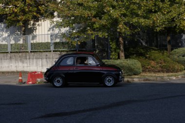 Bibbiano-Reggio Emilia Italy - 07 15 2015 : Free rally of vintage cars in the town square Fiat 500 black. High quality photo