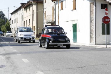 Bibbiano-Reggio Emilia Italy - 07 15 2015 : Free rally of vintage cars in the town square Fiat 500 black. High quality photo