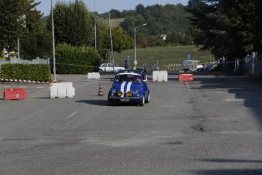 Bibbiano-Reggio Emilia Italy - 07 15 2015 : Free rally of vintage cars in the town square blue viper Fiat 500. High quality photo