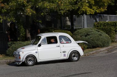Bibbiano-Reggio Emilia Italy - 07 15 2015 : Free rally of vintage cars in the town square Fiat 500 sport. High quality photo