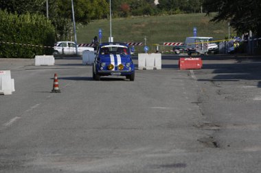 Bibbiano-Reggio Emilia Italy - 07 15 2015 : Free rally of vintage cars in the town square blue viper Fiat 500. High quality photo