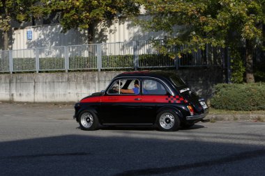 Bibbiano-Reggio Emilia Italy - 07 15 2015 : Free rally of vintage cars in the town square Fiat 500 black. High quality photo