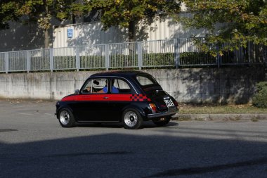 Bibbiano-Reggio Emilia Italy - 07 15 2015 : Free rally of vintage cars in the town square Fiat 500 black. High quality photo