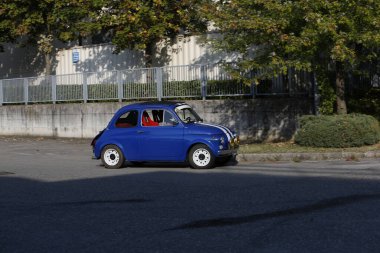 Bibbiano-Reggio Emilia Italy - 07 15 2015 : Free rally of vintage cars in the town square blue viper Fiat 500. High quality photo