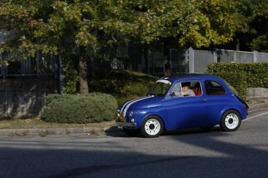 Bibbiano-Reggio Emilia Italy - 07 15 2015 : Free rally of vintage cars in the town square blue viper Fiat 500. High quality photo