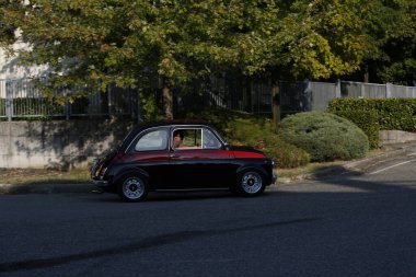 Bibbiano-Reggio Emilia Italy - 07 15 2015 : Free rally of vintage cars in the town square Fiat 500 black. High quality photo