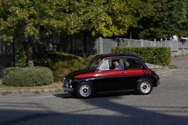 Bibbiano-Reggio Emilia Italy - 07 15 2015 : Free rally of vintage cars in the town square Fiat 500 black. High quality photo