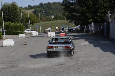 Bibbiano-Reggio Emilia Italy - 07 15 2015 : Free rally of vintage cars in the town square Fiat x 19 street. High quality photo