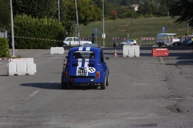 Bibbiano-Reggio Emilia Italy - 07 15 2015 : Free rally of vintage cars in the town square blue viper Fiat 500. High quality photo