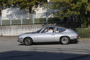 Bibbiano-Reggio Emilia Italy - 07 15 2015 : Free rally of vintage cars in the town square Lancia Fulvia Sport Zagato. High quality photo