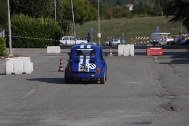 Bibbiano-Reggio Emilia Italy - 07 15 2015 : Free rally of vintage cars in the town square blue viper Fiat 500. High quality photo