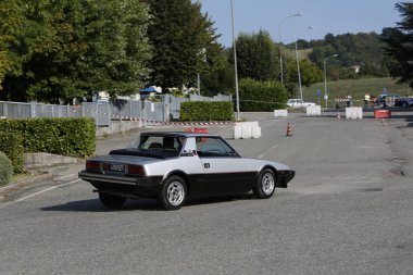 Bibbiano-Reggio Emilia Italy - 07 15 2015 : Free rally of vintage cars in the town square Fiat x 19 street. High quality photo