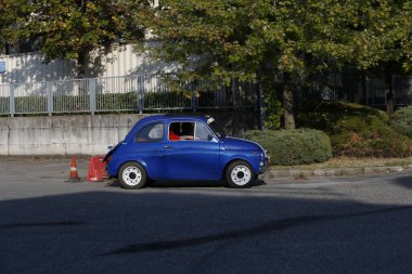 Bibbiano-Reggio Emilia Italy - 07 15 2015 : Free rally of vintage cars in the town square blue viper Fiat 500. High quality photo