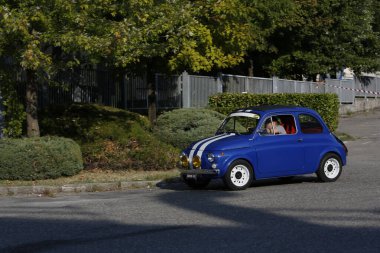 Bibbiano-Reggio Emilia Italy - 07 15 2015 : Free rally of vintage cars in the town square blue viper Fiat 500. High quality photo