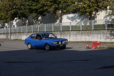 Bibbiano-Reggio Emilia Italy - 07 15 2015 : Free rally of vintage cars in the town square Fiat Rally 124. High quality photo