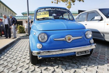 Bibbiano-Reggio Emilia Italy - 07 15 2015 : Free rally of vintage cars in the town square Fiat 500 Abarth. High quality photo