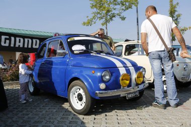 Bibbiano-Reggio Emilia Italy - 07 15 2015 : Free rally of vintage cars in the town square blue viper Fiat 500. High quality photo