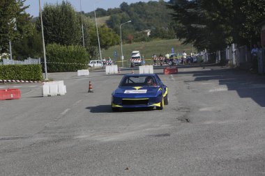 Bibbiano-Reggio Emilia Italy - 07 15 2015 : Free rally of vintage cars in the town square Fiat x19 proto. High quality photo
