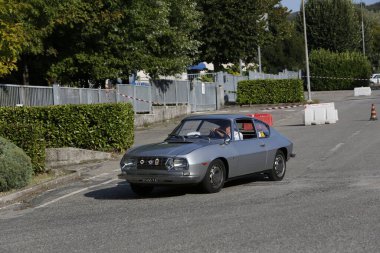 Bibbiano-Reggio Emilia Italy - 07 15 2015 : Free rally of vintage cars in the town square Lancia Fulvia Sport Zagato. High quality photo