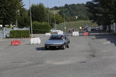 Bibbiano-Reggio Emilia Italy - 07 15 2015 : Free rally of vintage cars in the town square Fiat x 19 street. High quality photo
