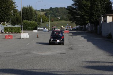 Bibbiano-Reggio Emilia Italy - 07 15 2015 : Free rally of vintage cars in the town square Fiat 500 black. High quality photo