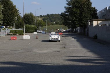 Bibbiano-Reggio Emilia Italy - 07 15 2015 : Free rally of vintage cars in the town square Triumph TR2 Cars. High quality photo