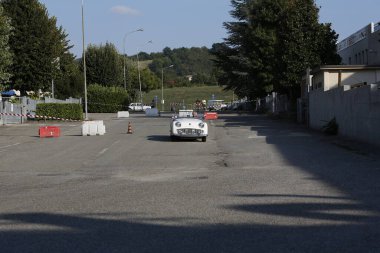 Bibbiano-Reggio Emilia Italy - 07 15 2015 : Free rally of vintage cars in the town square Triumph TR2 Cars. High quality photo