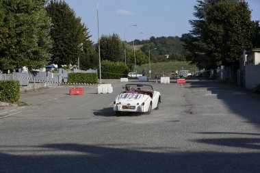 Bibbiano-Reggio Emilia Italy - 07 15 2015 : Free rally of vintage cars in the town square Triumph TR2 Cars. High quality photo