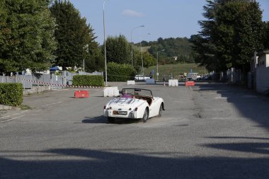 Bibbiano-Reggio Emilia Italy - 07 15 2015 : Free rally of vintage cars in the town square Triumph TR2 Cars. High quality photo