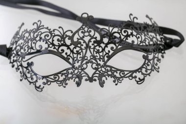 black Venetian style metal mask. High quality photo