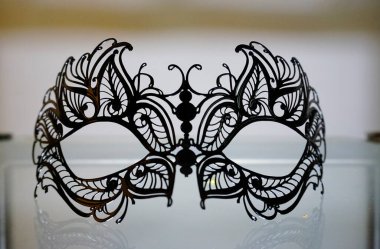 black Venetian style metal mask. High quality photo