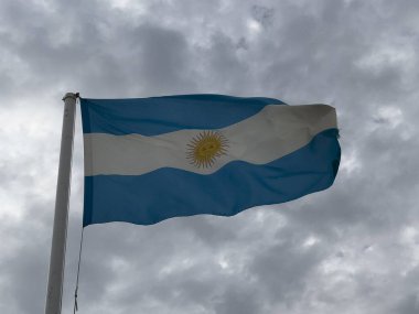 Argentine flag waving in the wind in sunny day. High quality photo