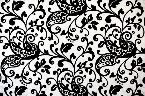 carpet with black floral decoration on a white ground. High quality photo