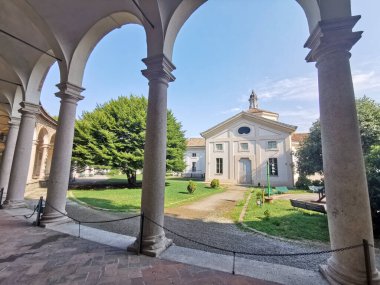 roundabout of the Besana in milan, arches on the park. High quality photo