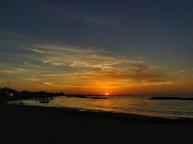 beach in Italy's Romagna Riviera at sunset. High quality photo