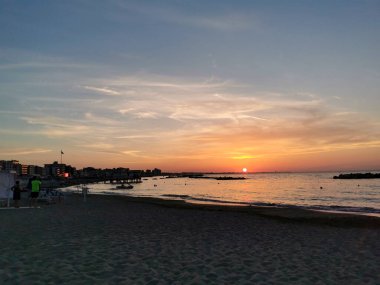 beach in Italy's Romagna Riviera at sunset. High quality photo