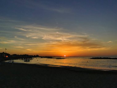 beach in Italy's Romagna Riviera at sunset. High quality photo