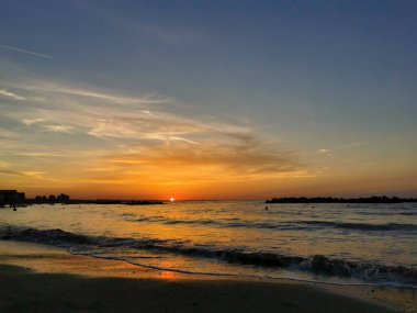 beach in Italy's Romagna Riviera at sunset. High quality photo