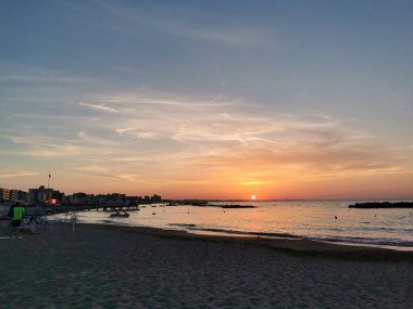 beach in Italy's Romagna Riviera at sunset. High quality photo