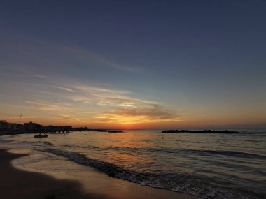 beach in Italy's Romagna Riviera at sunset. High quality photo
