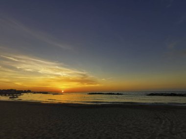 beach in Italy's Romagna Riviera at sunset. High quality photo