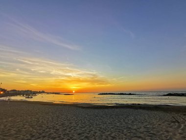 beach in Italy's Romagna Riviera at sunset. High quality photo